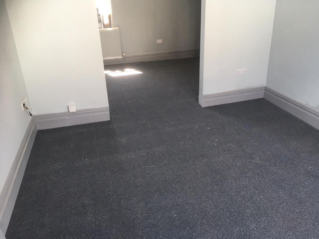 Third bedroom, freshly decorated with grey carpet