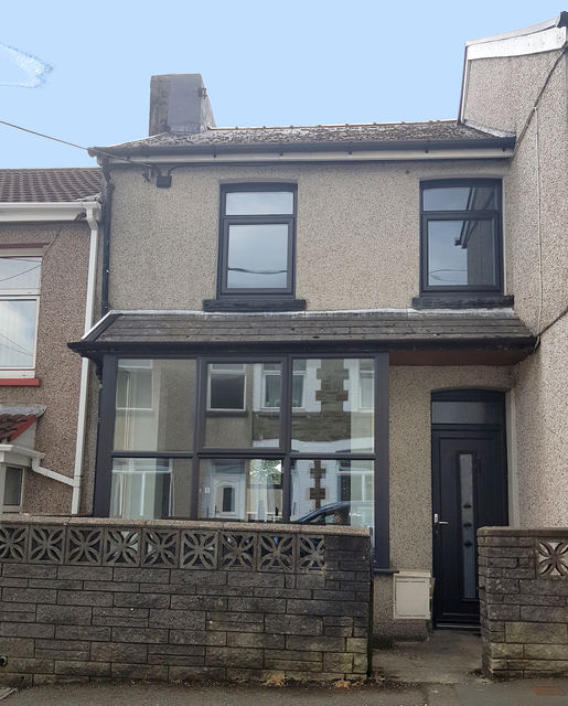 Front elevation with bay window, new anthracite windows and composite door